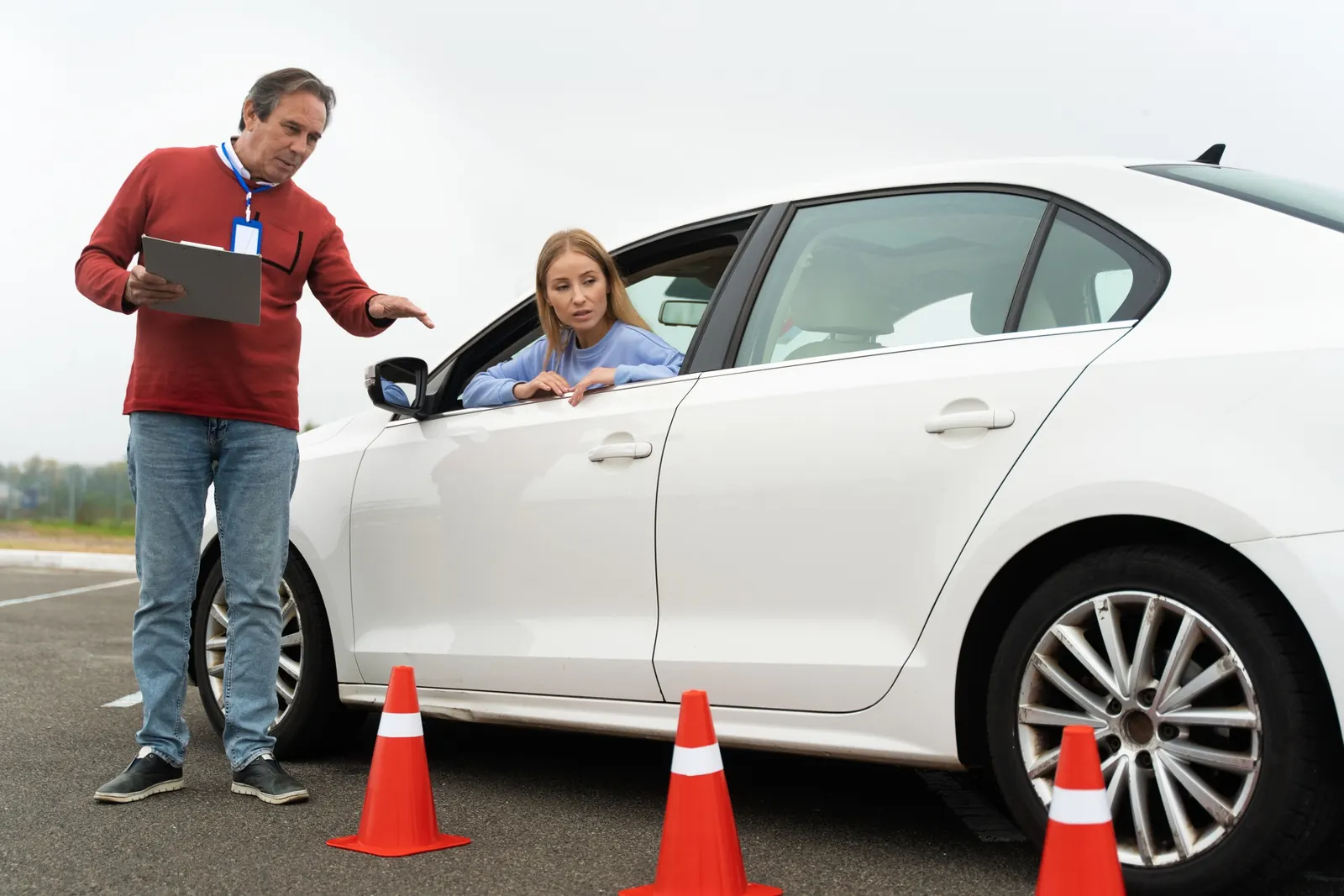 Road test support with a driving school vehicle