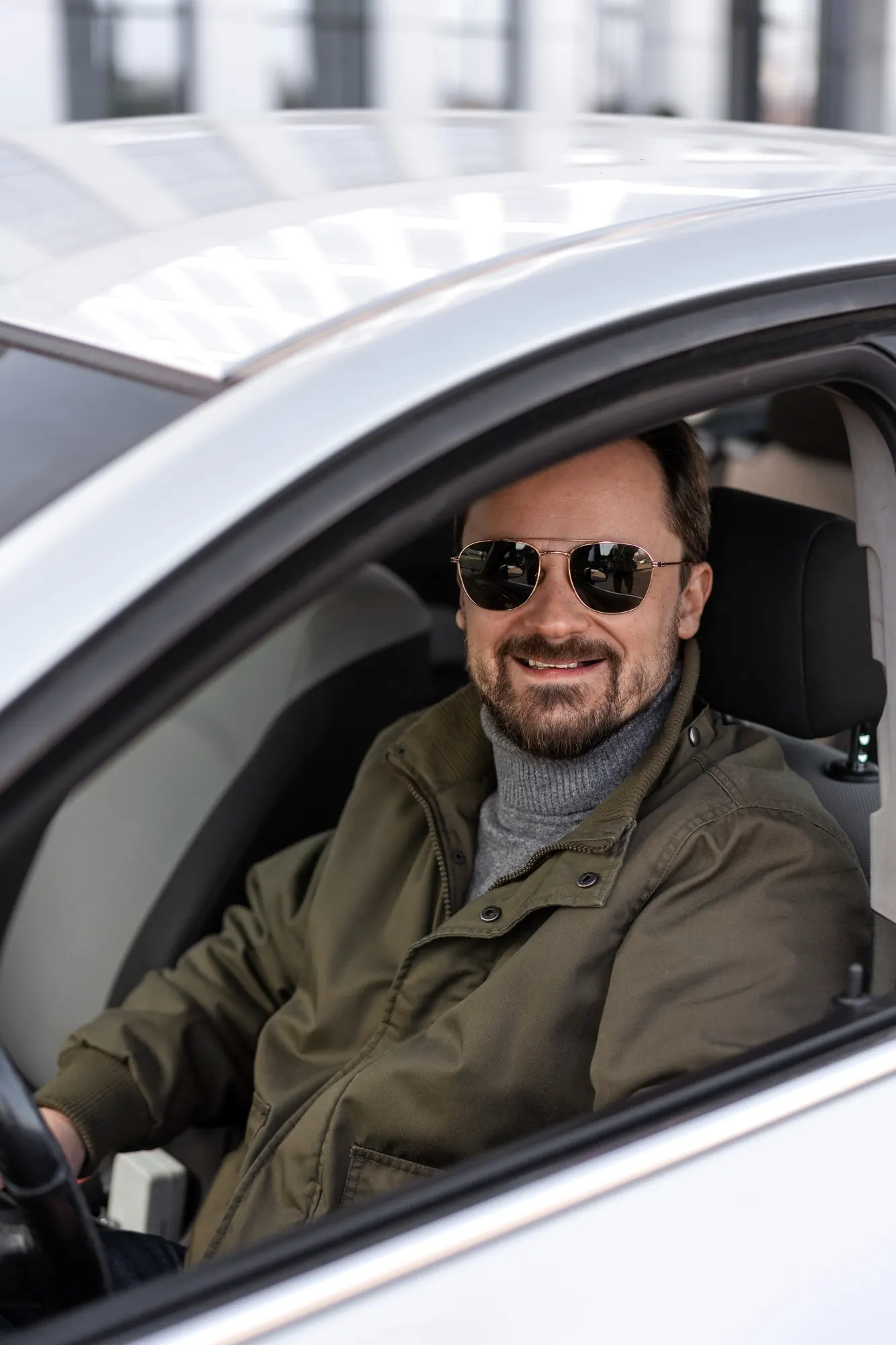 Adult student taking a driving lesson